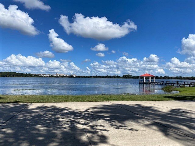 Lake Baldwin Park dog beach and gazebo in Orlando Florida with scenic lake views
